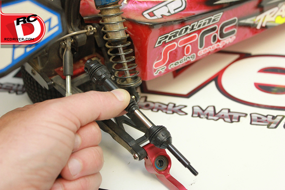 The new Traxxas Steel shafts come assembled. Position the new axle in place and slide the cup end onto the differential outdrive.